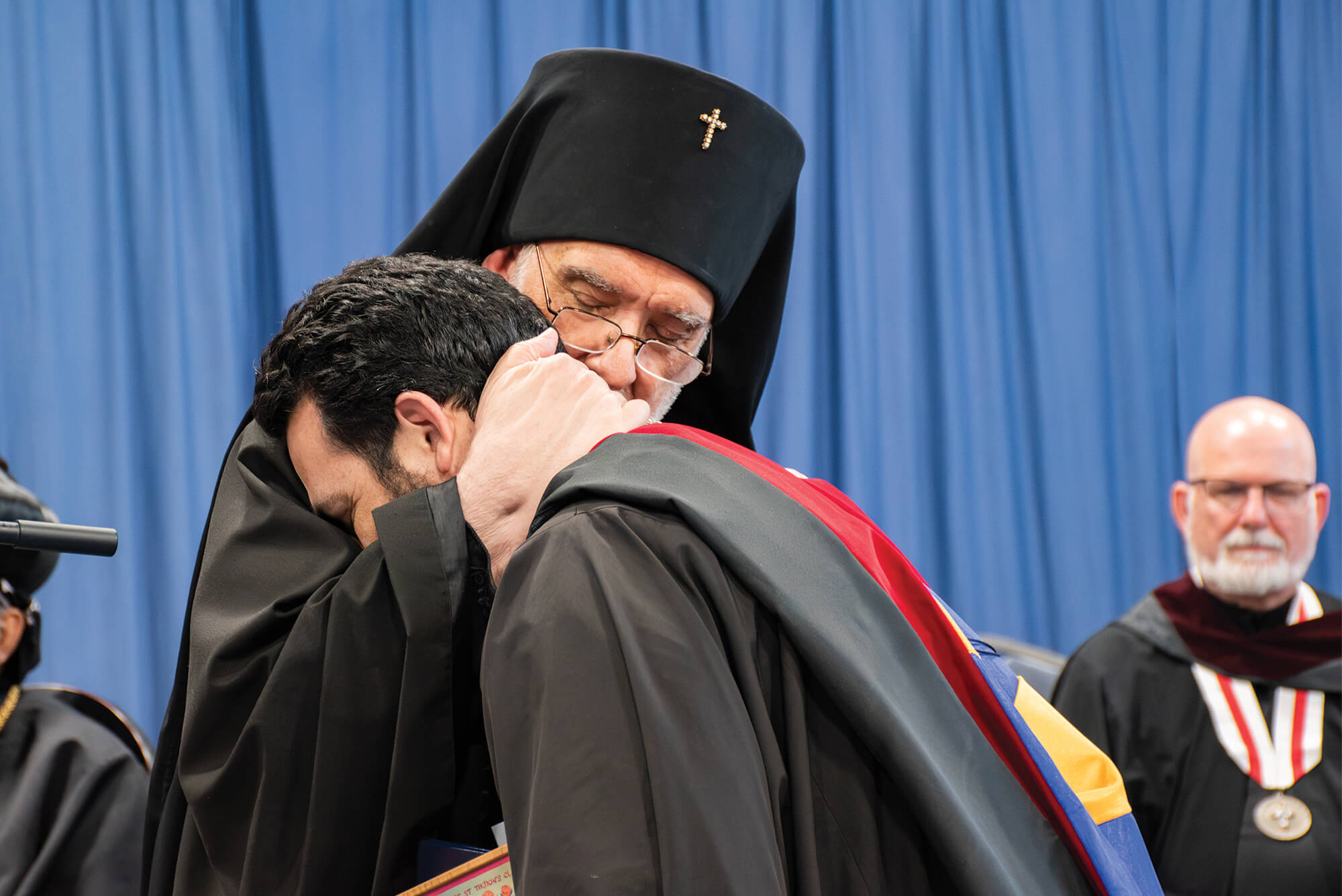 St. Tikhon's Seminary about rectors message priests hugging.