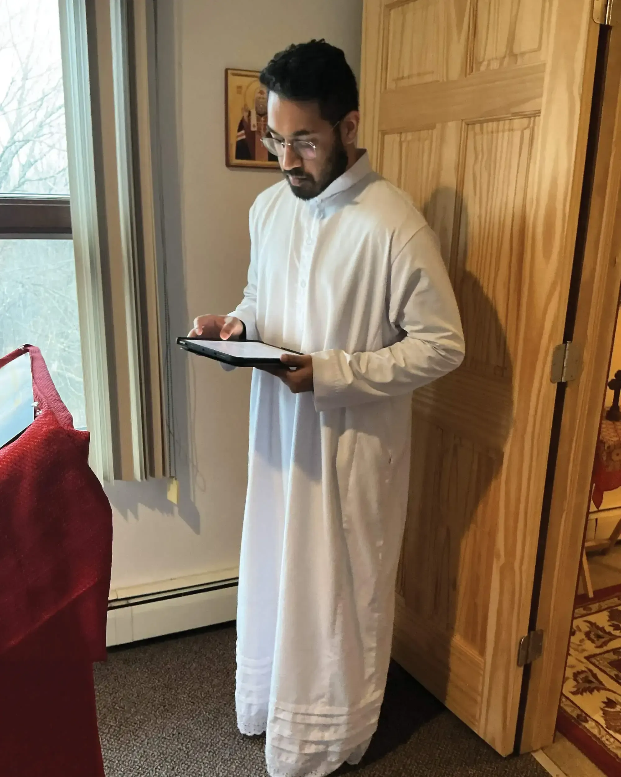 St. Tikhon's Seminary Stories Christen George reading a Malankara service.